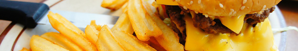 Eating Burger at Blake's Lotaburger restaurant in Albuquerque, NM.